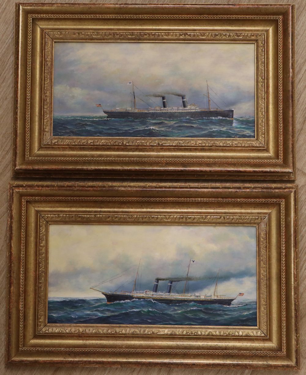 A pair of modern oils on board of American steamships, indistinctly signed, 14 x 29cm